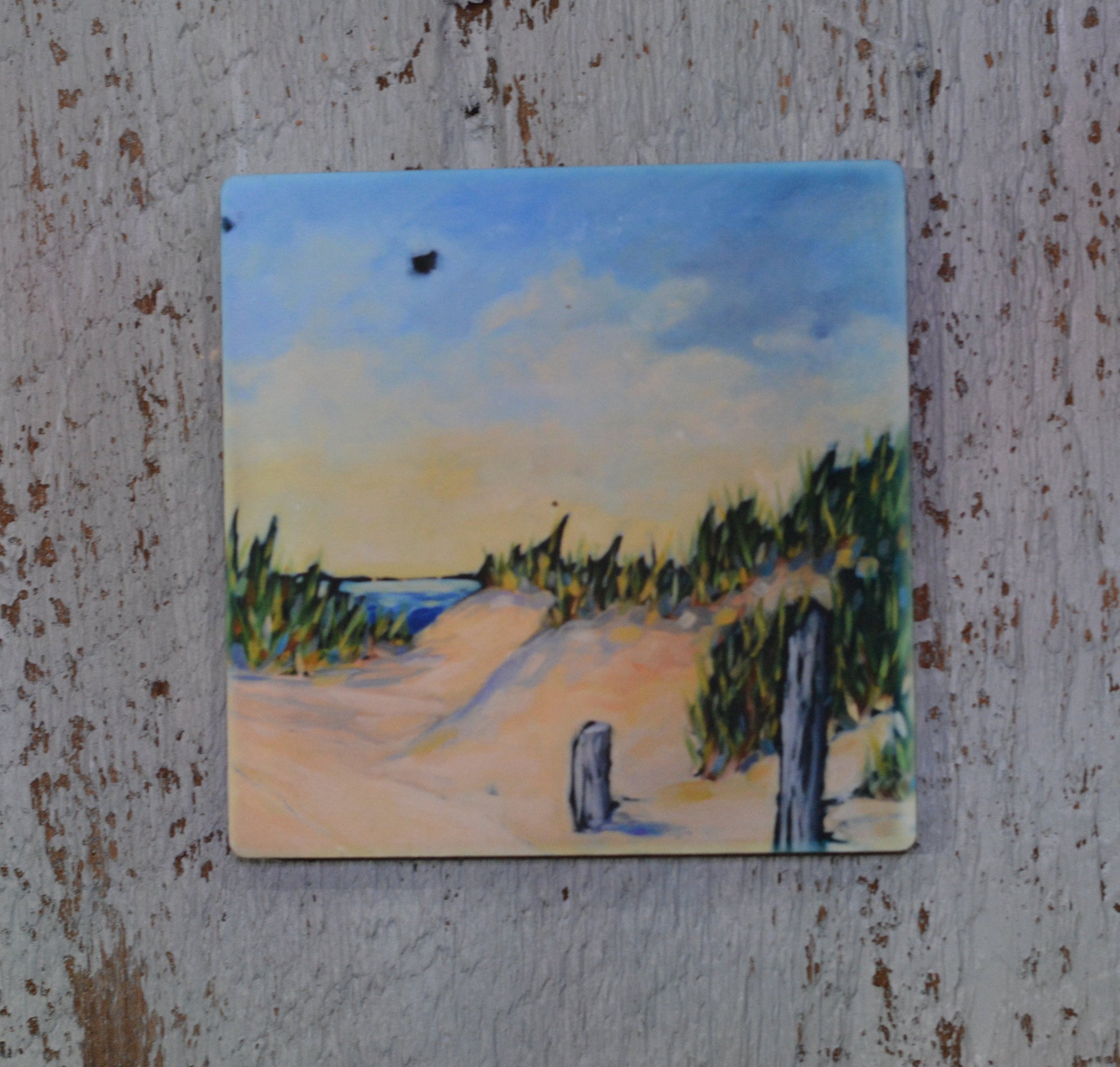 Coaster, trivet, and magnet featuring Peace at the Lake artwork by Dreese Fine Art arranged on a tabletop