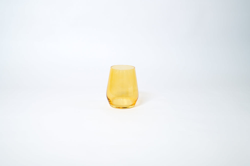 Sunshine Yellow Stemless Colored Wine Glass by glasshauseco, bright yellow glass on a neutral background
