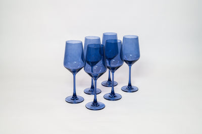 Indigo-go Colored Wine Glass showing rich indigo tint, stemmed style, displayed upright.