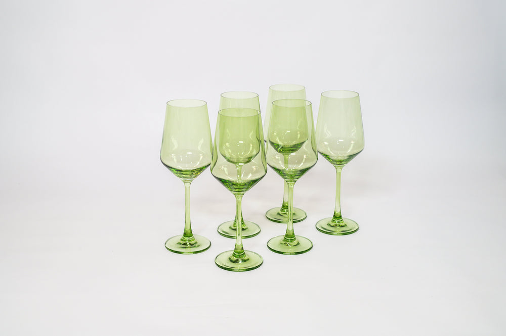Matcha Green stemless wine glass from GlassHauseCo displaying a soft green tint and rounded shape on a plain surface