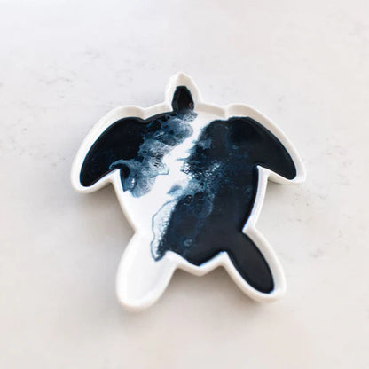 resin turtle patterned ceramic dish on a light gray background
