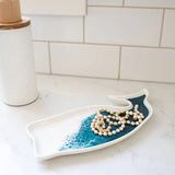 Ceramic whale-shaped tray with hand-poured resin swirls in coastal colors