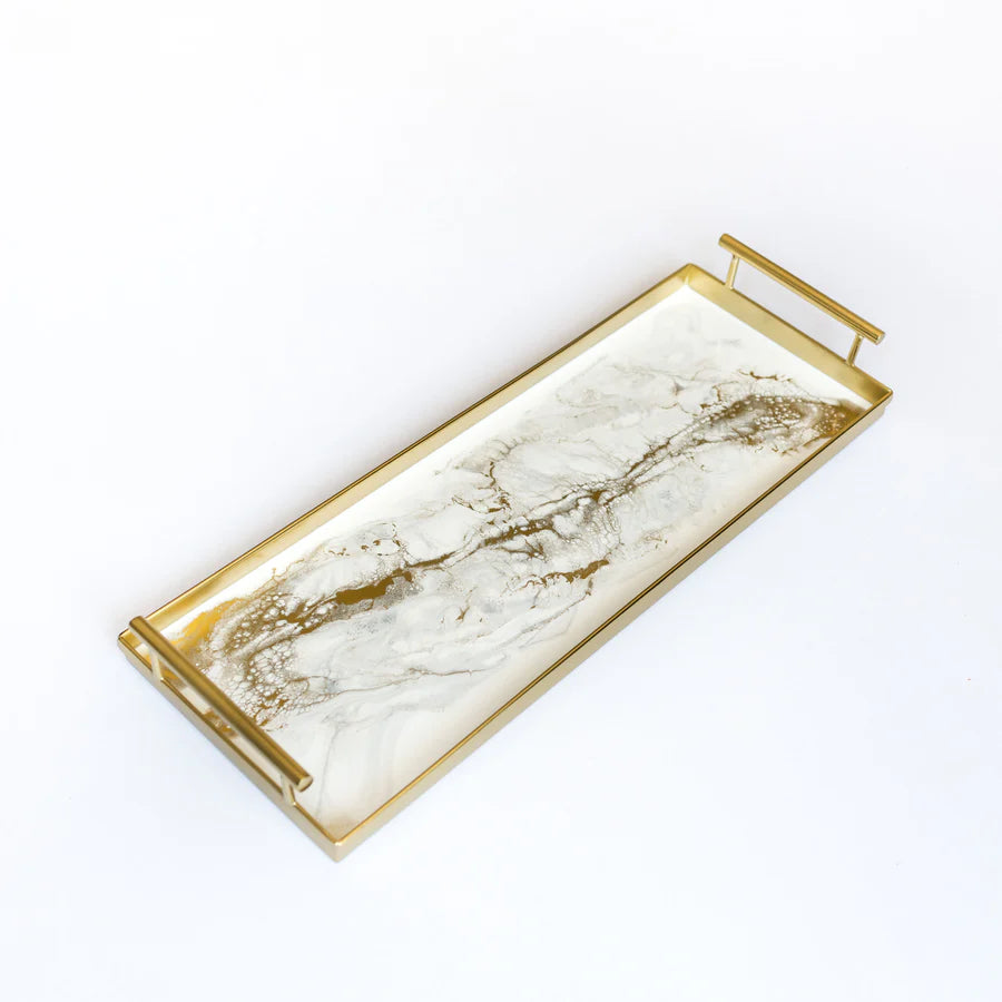 Rectangular gold resin serving tray with built-in handles and rubber feet on a white background