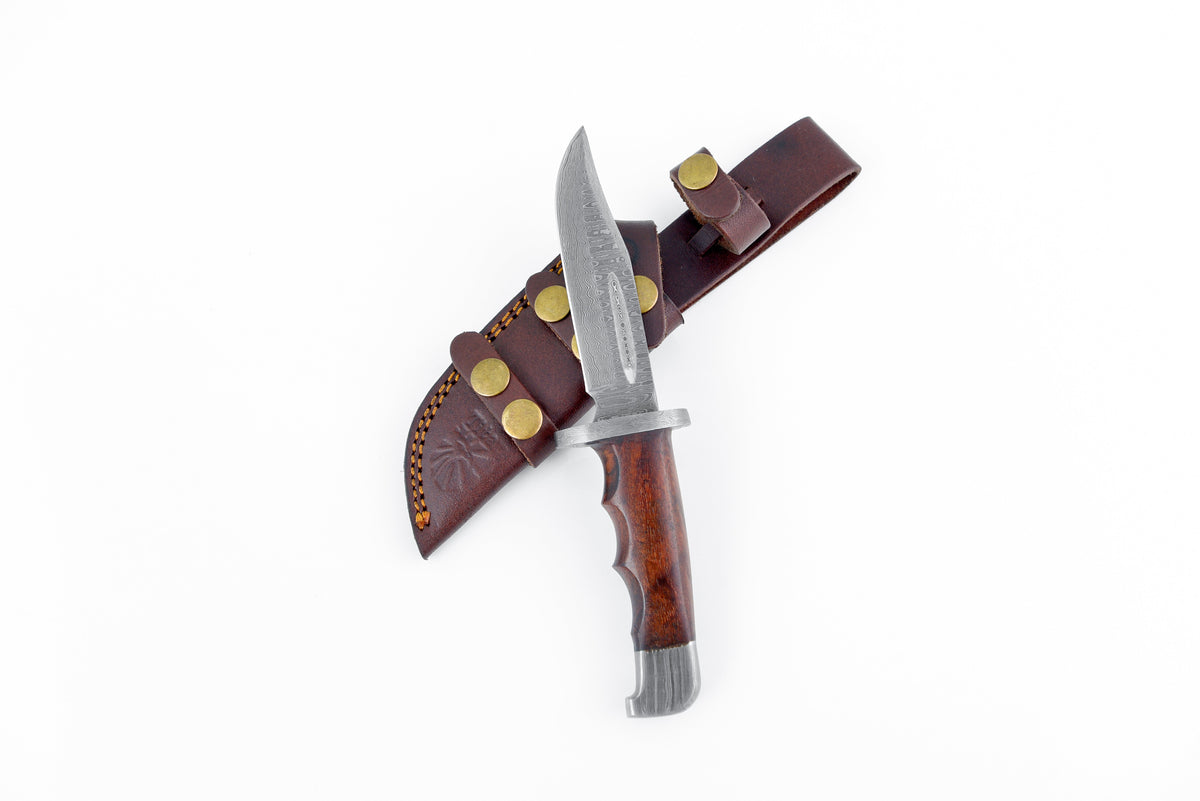 Damascus Hunting Knife Full Tang with Damascus Hilt Custom Titan Hunter TD-216 knife laying on dark background showing the blade and handle