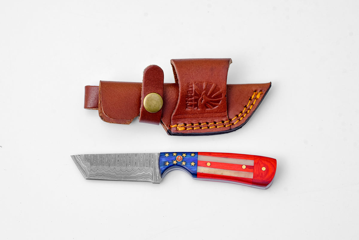 Titan United Star Damascus Tanto blade TK-210M knife with bone and wood handle displayed on wooden surface