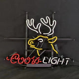 Yellow and white neon outline of a deer's head above red and white neon text reading 'Coors Light' on a black metal frame against a dark background.