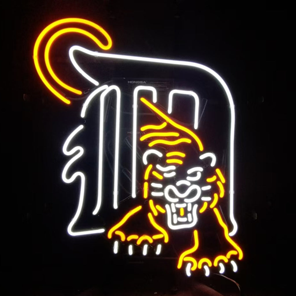 Neon sign featuring a white outlined Detroit Tigers 'D' logo with an orange tiger head and paw emerging from the letter, set against a black background.