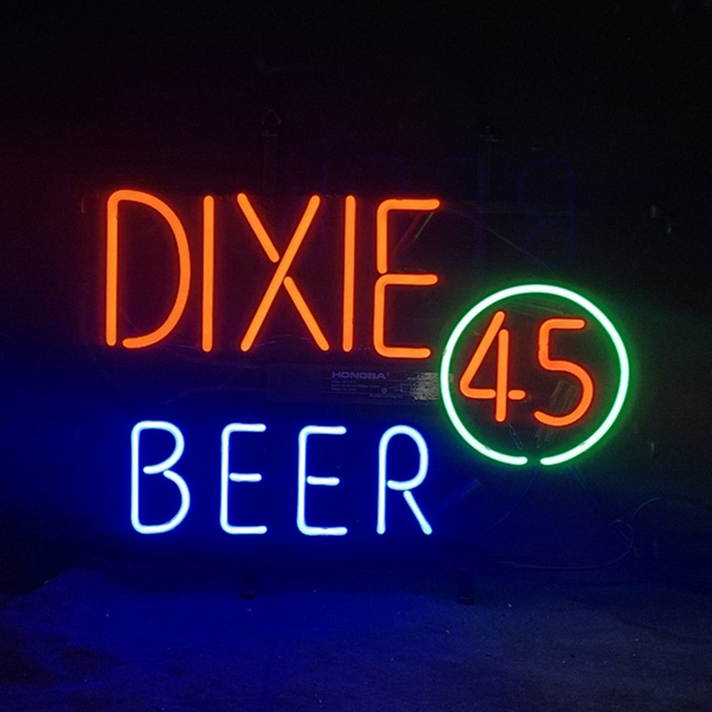 Neon sign reading 'DIXIE' in bright orange, 'BEER' in blue below, and '45' in orange encircled by a green ring on a dark background.