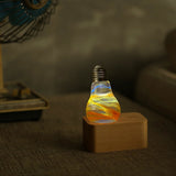 EP Light Solar System Resin LED Lamp with wooden base showing handcrafted resin design