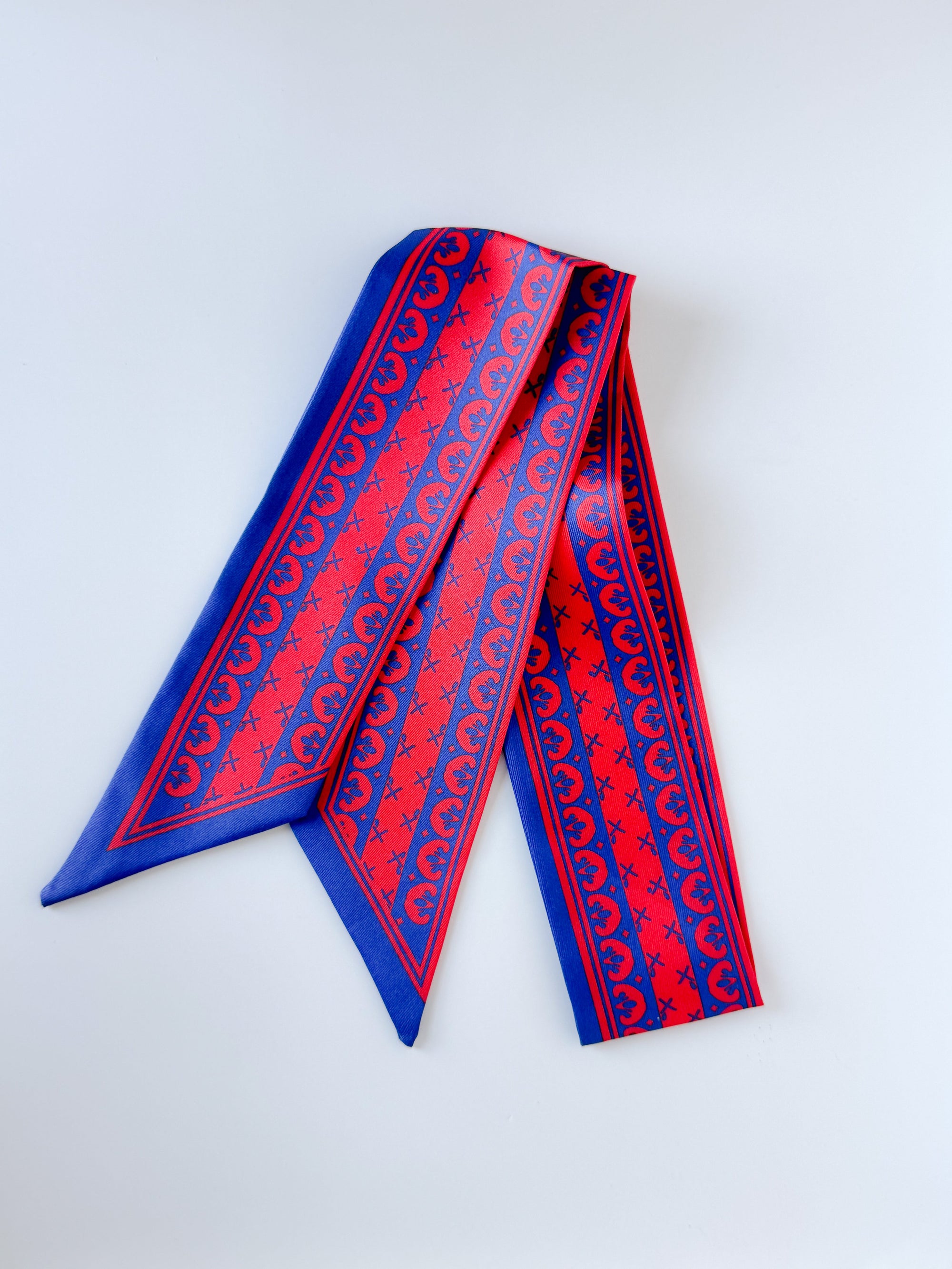 Blue and Red Ribbon Twilly skinny scarf with vibrant ribbon print