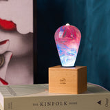 Handcrafted marbled resin LED bulb with wooden base option