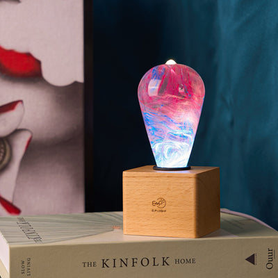 Handcrafted marbled resin LED bulb with wooden base option