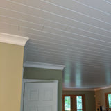 EWCR43 Cove Crown unfinished hardwood molding showing profile and wood grain