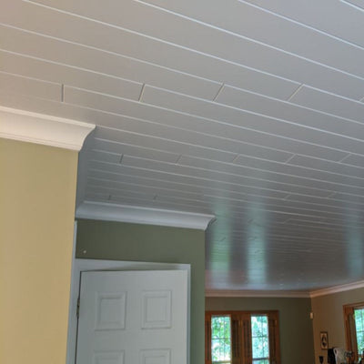 EWCR43 Cove Crown unfinished hardwood molding showing profile and wood grain