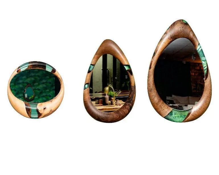 Handcrafted epoxy resin and walnut mirrors in round and teardrop shapes