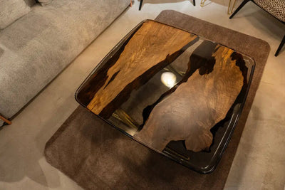 Ivory shaped epoxy resin coffee table made with walnut wood and aluminum legs