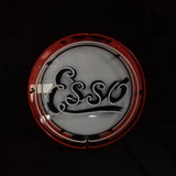 Round neon sign featuring the word 'Esso' in black cursive script on a white background with a red circular border.
