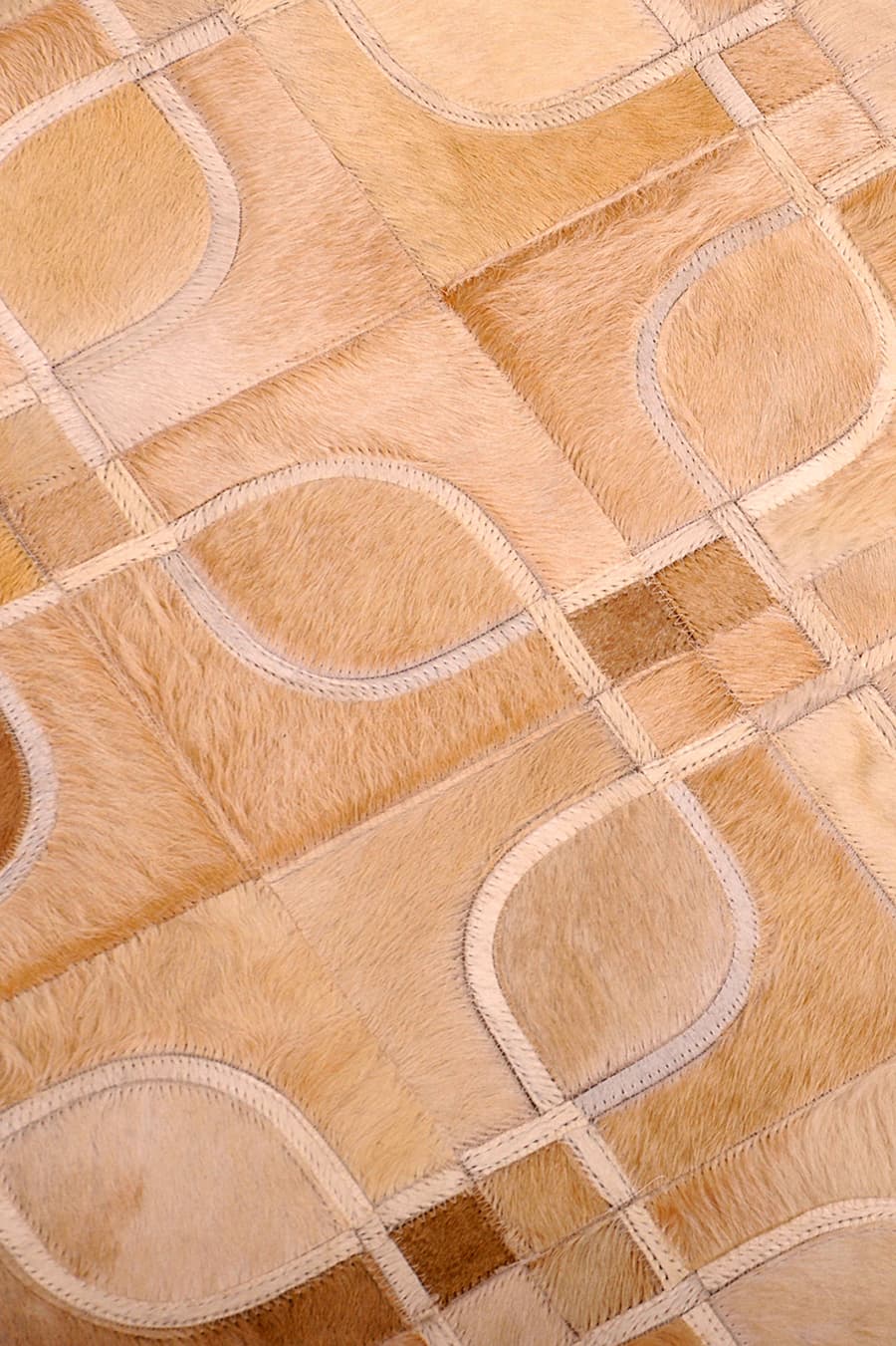 Eyes – Geometric Cowhide Rug with Curved Motif by Homelosophy