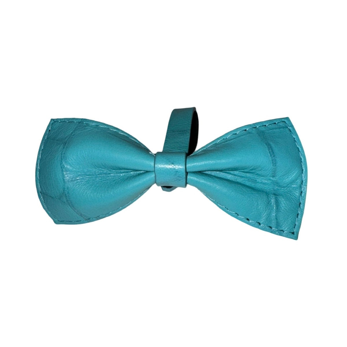 Turquoise blue embossed croc leather bow tie with visible stitching and a central knot detail against a white background