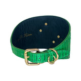 Bright green textured collar resembling snake skin with gold buckle and D-ring, shown inside out to reveal black interior and gold rivets.