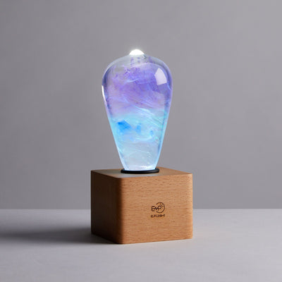 EP Light Faith Resin Table Lamp with wooden base and unique resin design