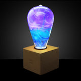 EP Light Faith Resin LED Bulb handcrafted with eco-friendly resin in unique colors