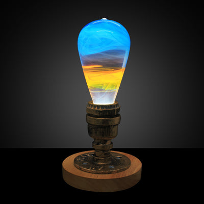 EP Light 4-Pack Resin LED Bulb Bundle showing Fire, Nebula, Youth, and Sunrise bulbs with wood base