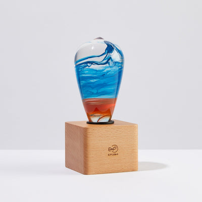 EP Light Fire Resin Table Lamp with wooden base and glowing LED bulb