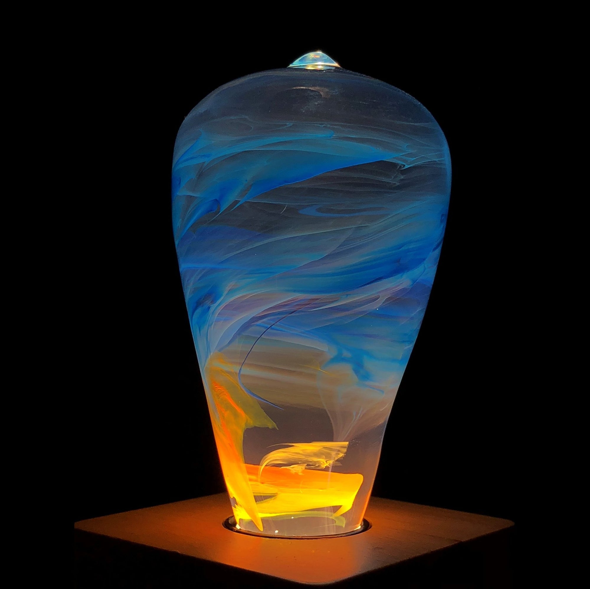 EP Light 4-Pack Resin LED Bulb Bundle showing Fire, Nebula, Youth, and Sunrise bulbs with wood base