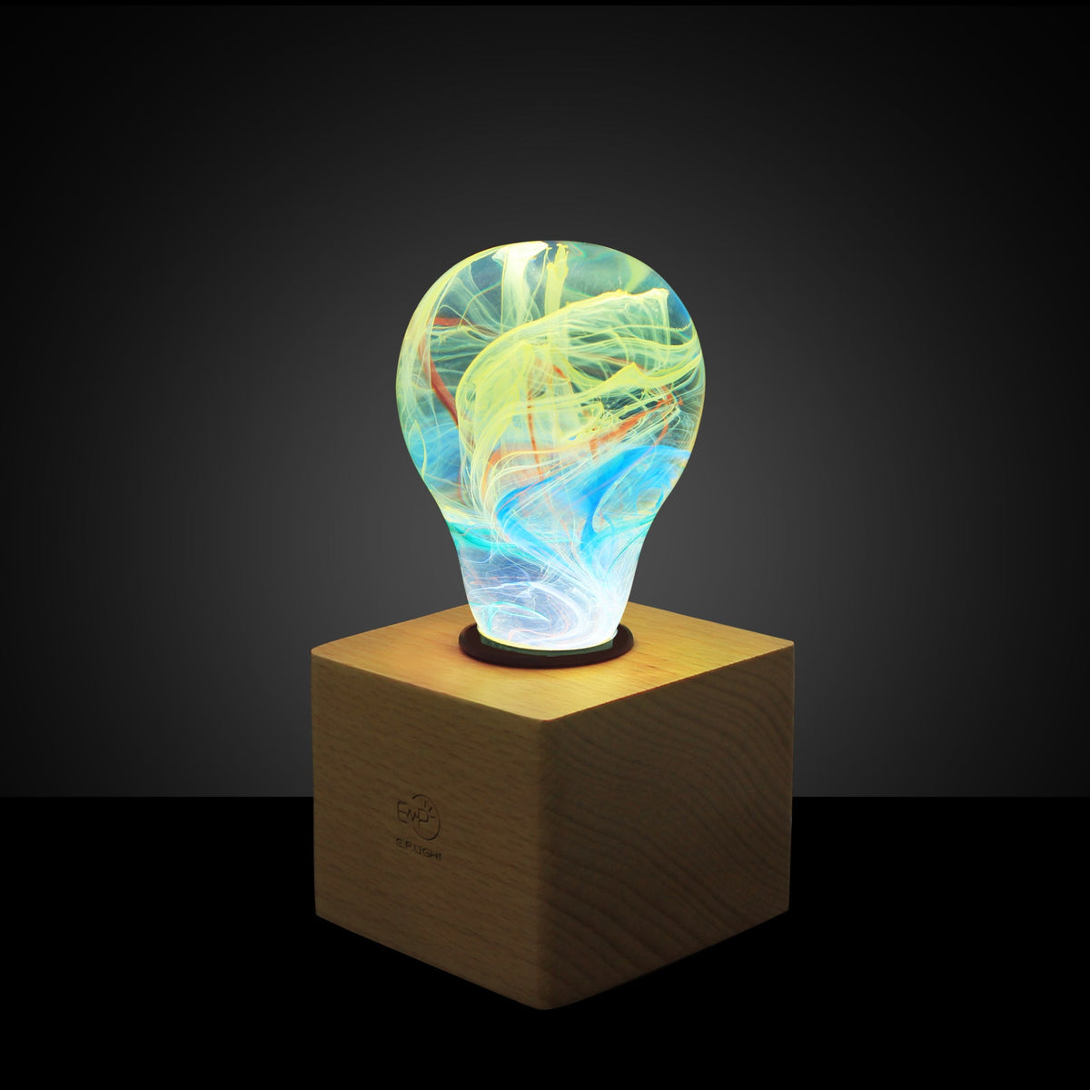 EP Light Firework Resin LED Bulb handcrafted with firework design in resin, shown with wooden base options