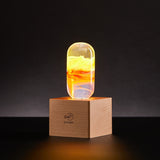Handcrafted flame resin LED table lamp with wooden cube base
