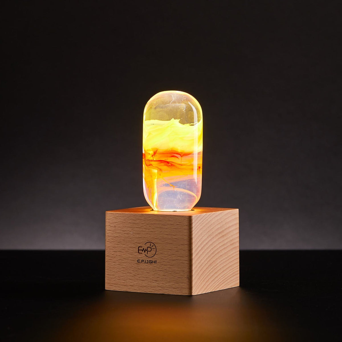 Handcrafted flame resin LED table lamp with wooden cube base