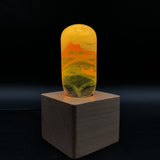 Handcrafted flame resin LED table lamp with wooden cube base