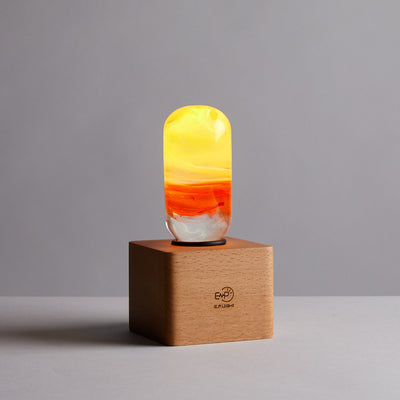 Handcrafted flame resin LED table lamp with wooden cube base