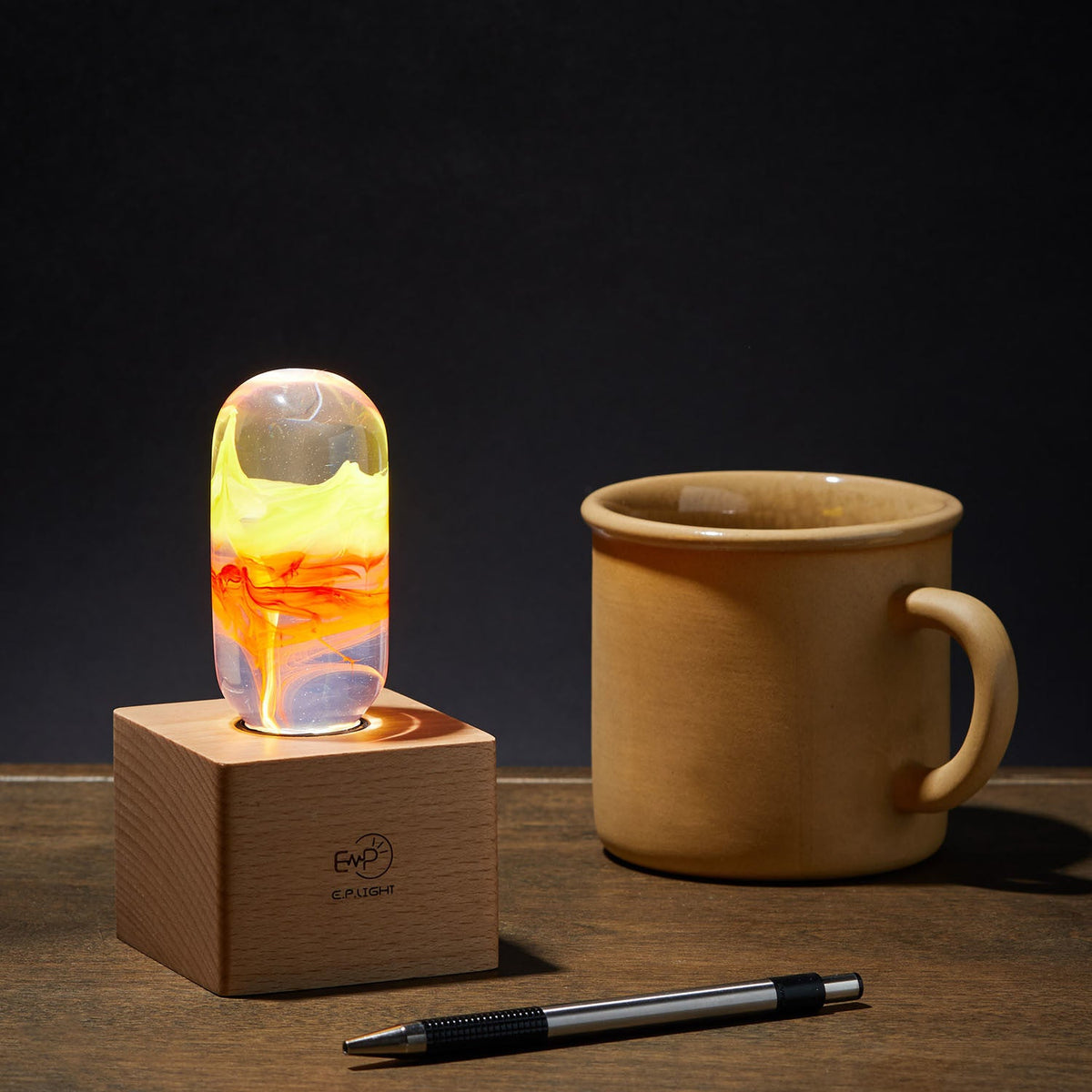 Handcrafted flame resin LED table lamp with wooden cube base
