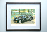 Framed watercolor print of a shiny black 1973 Volkswagen Karmann Ghia parked outdoors with green trees in the background.