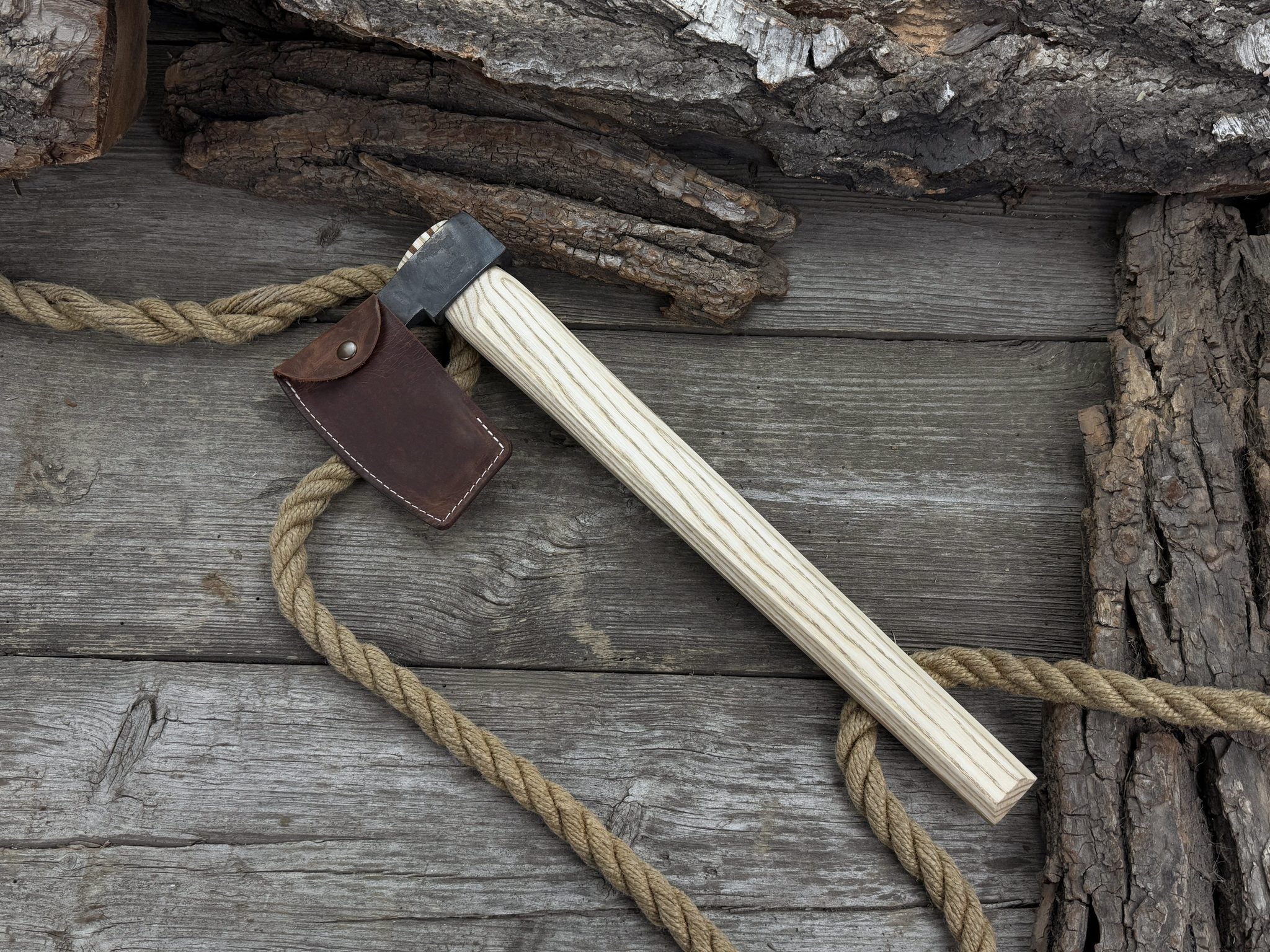 Hand-forged carpenter's axe with belt loop and leather sheath