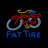 Fat Tire Bicycle neon sign glowing in blue and red variants