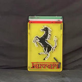 Rectangular neon sign with a yellow background featuring a black prancing horse outlined in white, topped by green, white, and red horizontal bands, and 'Ferrari' in red neon at the bottom