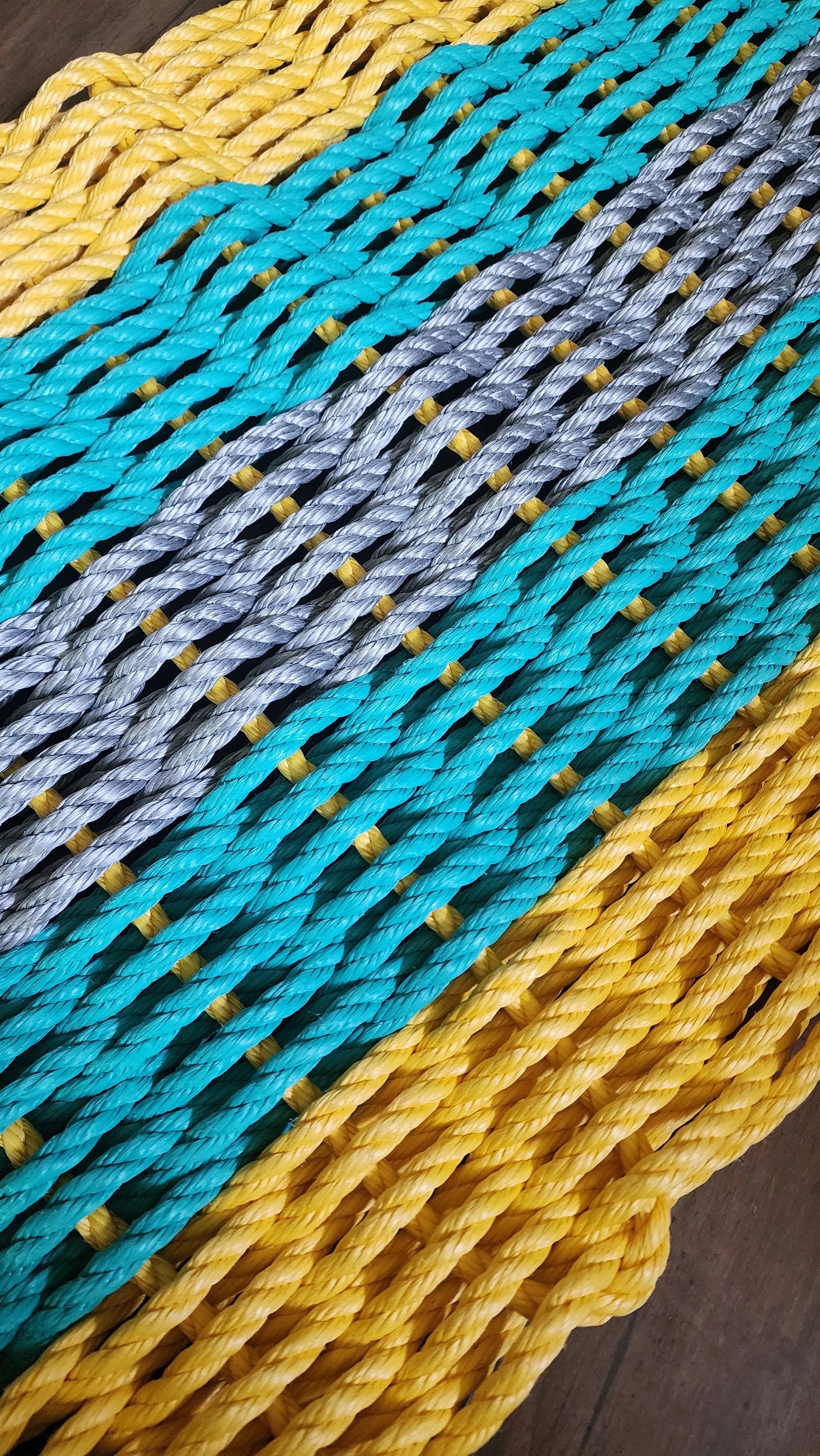 Five Stripe Rope Mat in yellow, teal, and gray stripes by Little Salty Rope