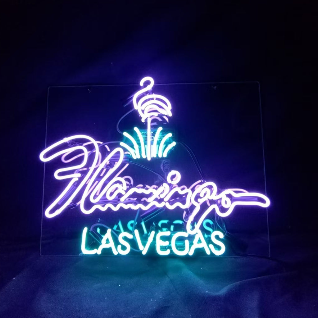 Flamingo Las Vegas Neon Sign illuminated in pink with acrylic backing hanging on a wall