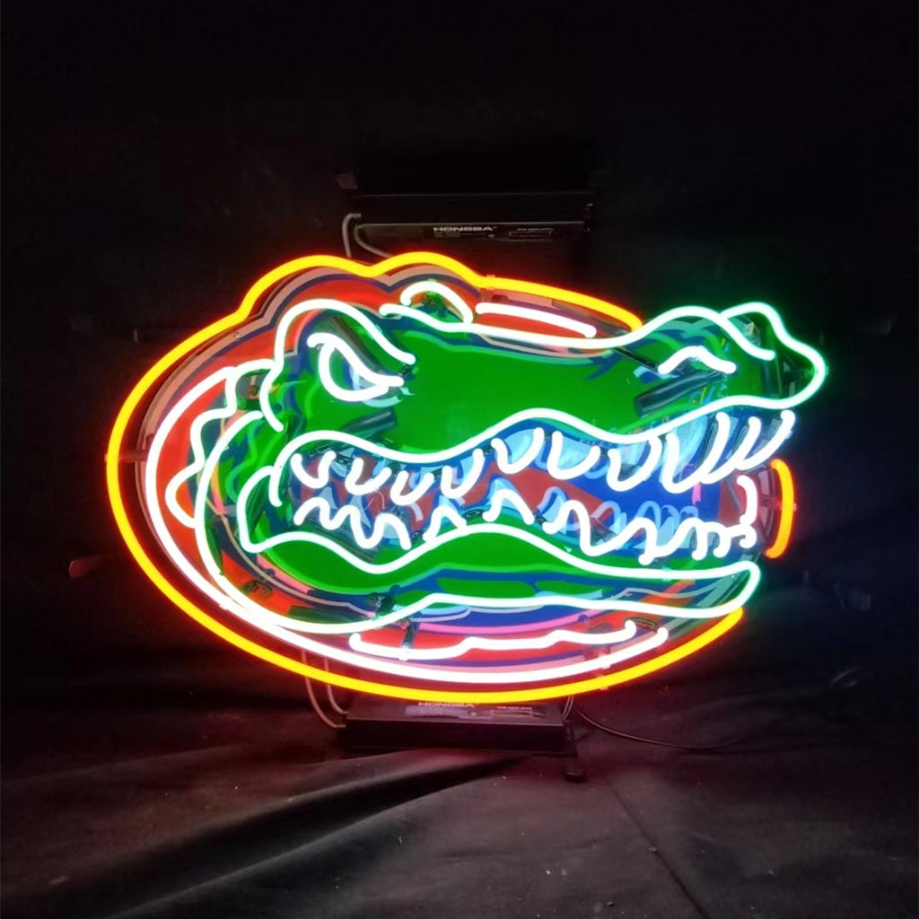 Florida Gators Neon Sign glowing on a wall with metal grid backing