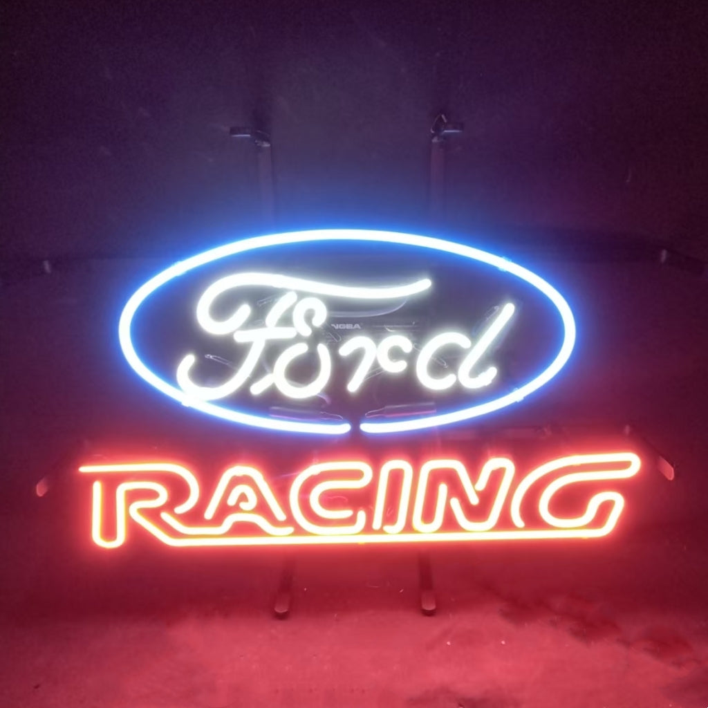 Neon sign with a blue oval surrounding white cursive 'Ford' lettering above bright red block letters spelling 'RACING' on a dark background.