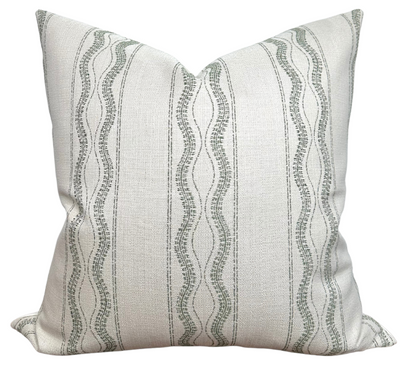 Zanzibar Outdoor Pillow Cover in Moss showing two-sided design with patterned front and ivory linen back