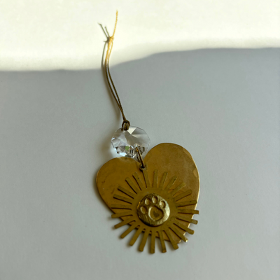 Fur-ever and Always Ornament featuring hammered brass and vintage glass crystal hanging on cord