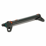Aquazoom Oscillating Sprinkler positioned on green grass, spraying a wide pattern of water over a large yard