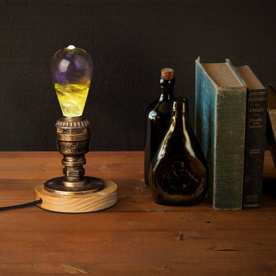 EP Light Golden Resin LED Bulb handcrafted with eco-friendly resin and wooden base options