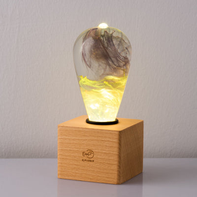 EP Light Golden Resin LED Bulb handcrafted with eco-friendly resin and wooden base options