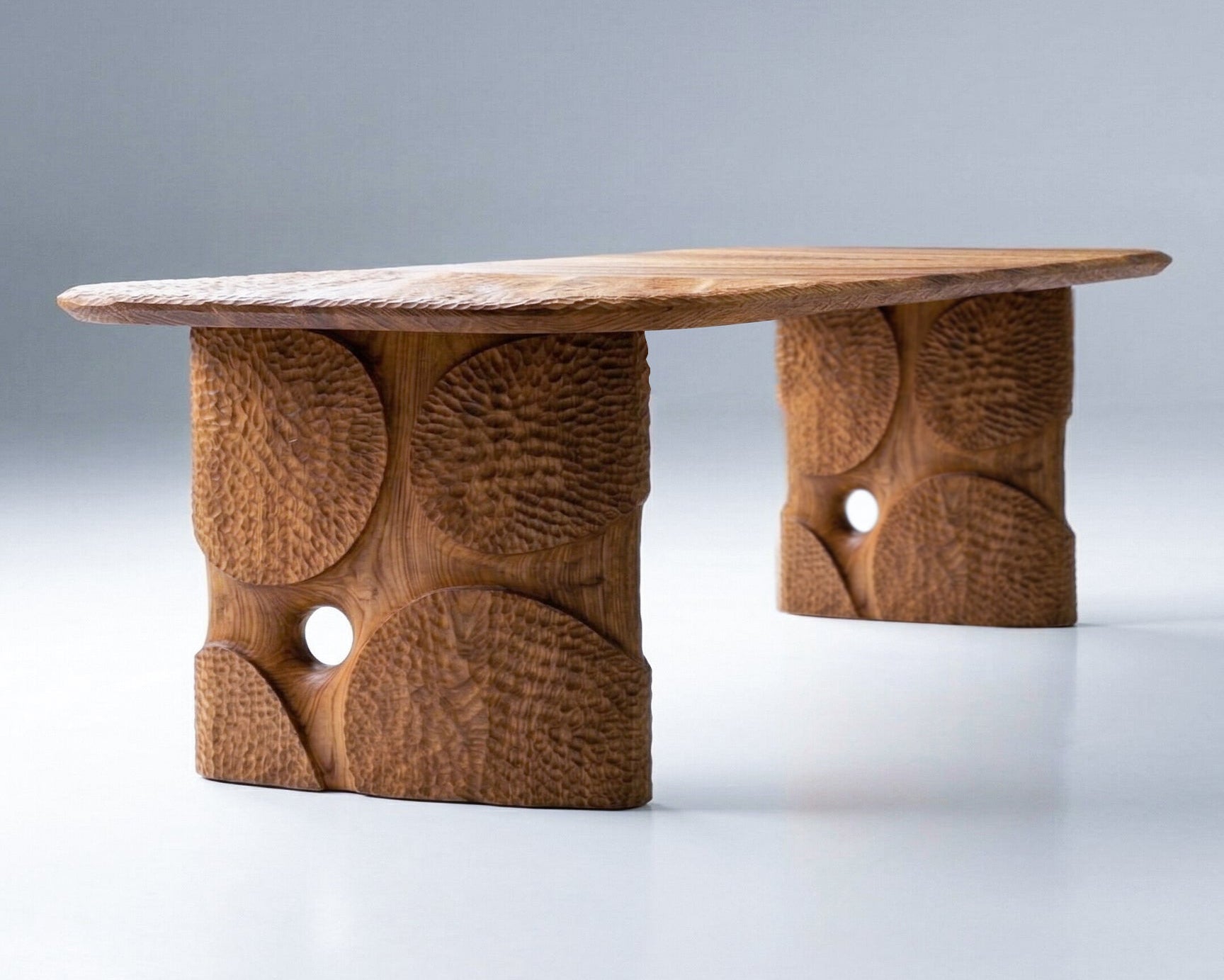 Hand-carved solid oak dining table with geometric patterns and custom-designed legs