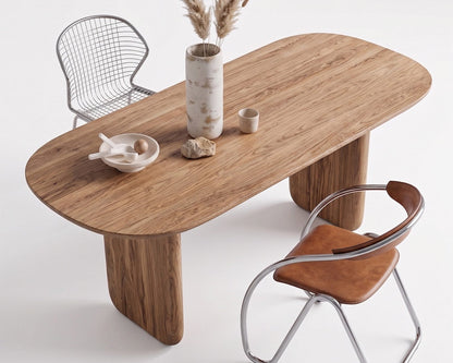 Oval solid wood dining table with chestnut wood finish and custom solid wood legs